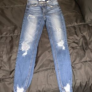 light blue distressed jeans